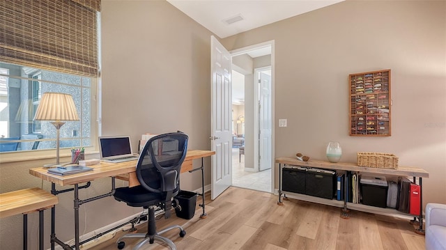 office space featuring light hardwood / wood-style flooring