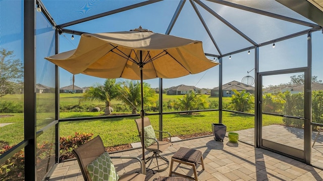 7525 Alumni Trl, Sarasota, FL 34243 - unfurnished sunroom featuring healthy amount of natural light and a residential view