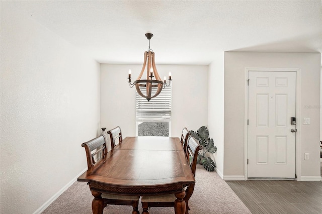 dining room featuring a chandelier