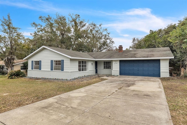 ranch-style house with a garage and a front yard