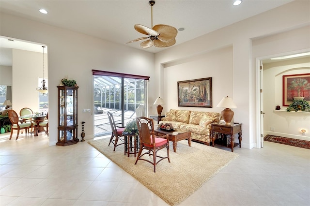 tiled living room with ceiling fan