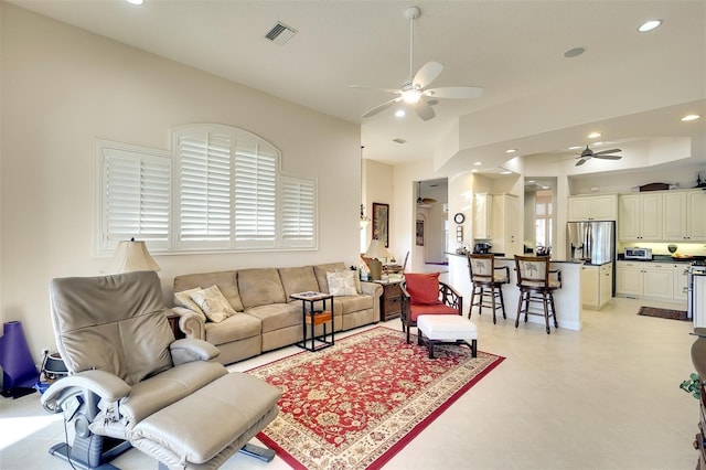 living room with ceiling fan