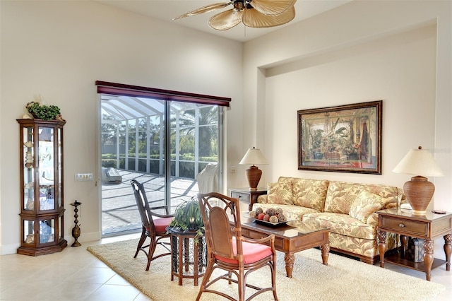 tiled living room featuring ceiling fan