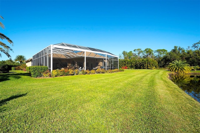 view of yard with a lanai