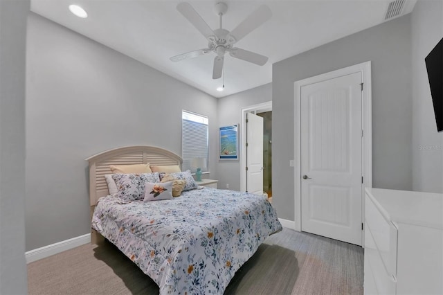 carpeted bedroom featuring ceiling fan