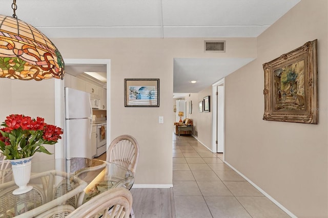 dining area with light hardwood / wood-style flooring