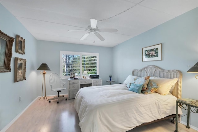 bedroom featuring light wood-type flooring and ceiling fan