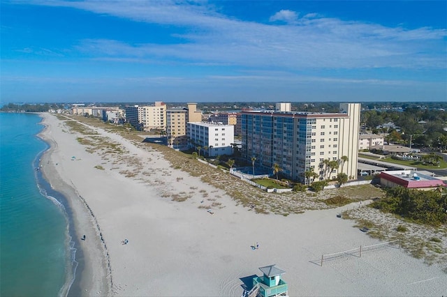 bird's eye view with a water view and a view of the beach