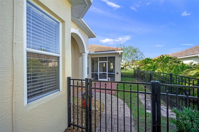 exterior space with a sunroom