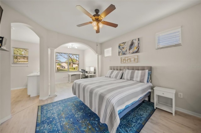 bedroom featuring light hardwood / wood-style flooring and ceiling fan