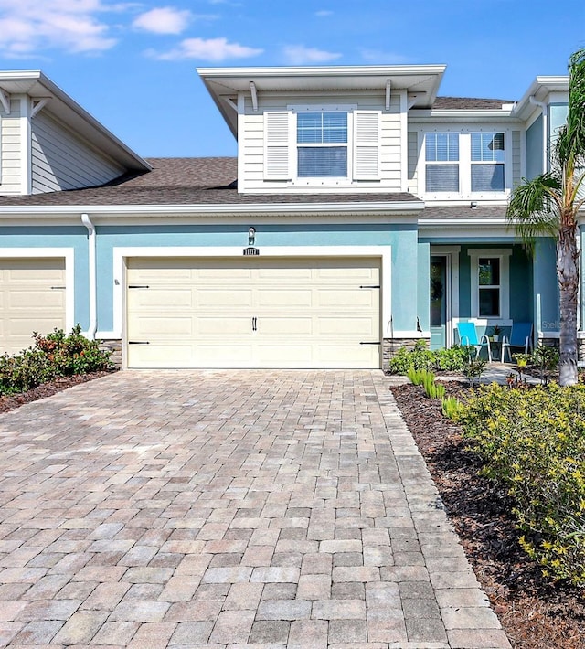 view of front of home featuring a garage