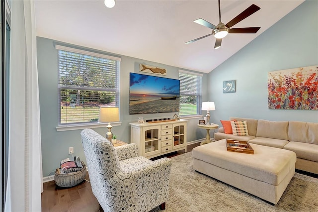 living room featuring hardwood / wood-style flooring, ceiling fan, and lofted ceiling