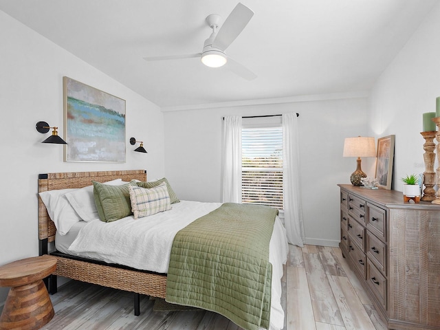 bedroom featuring ceiling fan and light hardwood / wood-style floors