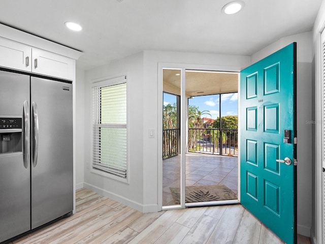 foyer featuring light wood-type flooring