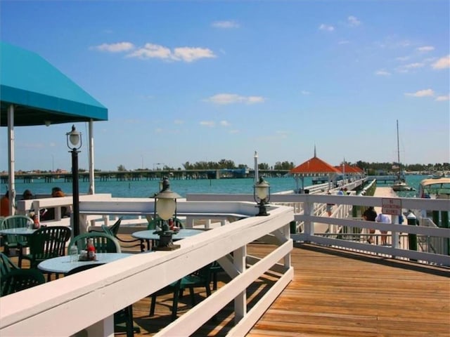 dock area featuring a water view