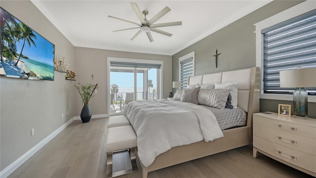 bedroom featuring access to exterior, ceiling fan, light hardwood / wood-style flooring, and crown molding