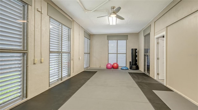 exercise area featuring ceiling fan