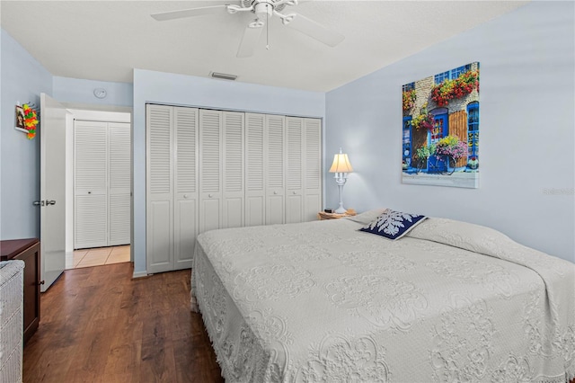 bedroom featuring dark hardwood / wood-style floors and ceiling fan