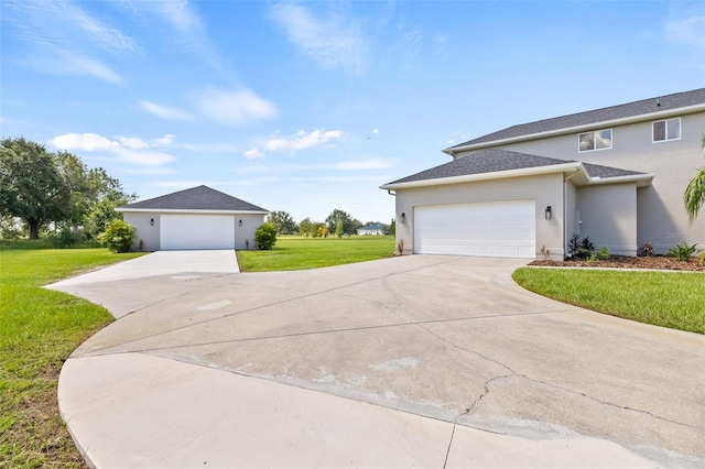 view of home's exterior featuring a yard and a garage