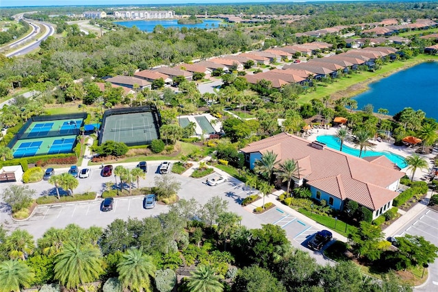 drone / aerial view with a water view