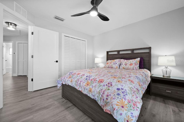 bedroom featuring a closet, ceiling fan, and hardwood / wood-style flooring