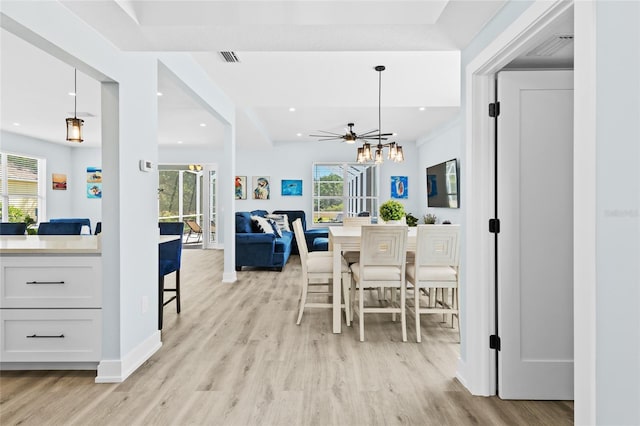 dining room featuring ceiling fan and light hardwood / wood-style flooring