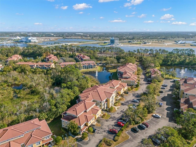 aerial view with a water view and a residential view