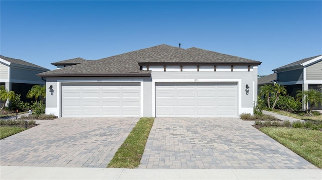 view of front of home with a garage