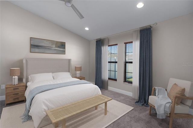 carpeted bedroom featuring ceiling fan and lofted ceiling