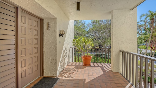 doorway to property with a balcony