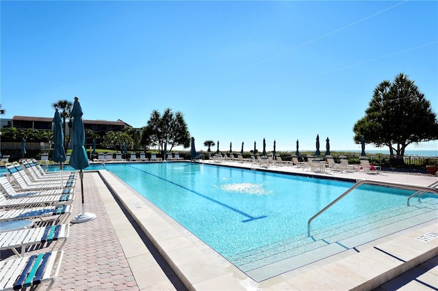 view of swimming pool featuring a patio area