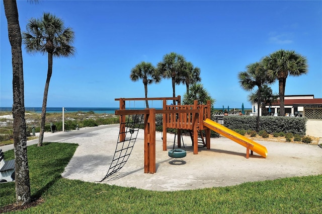 view of jungle gym with a water view