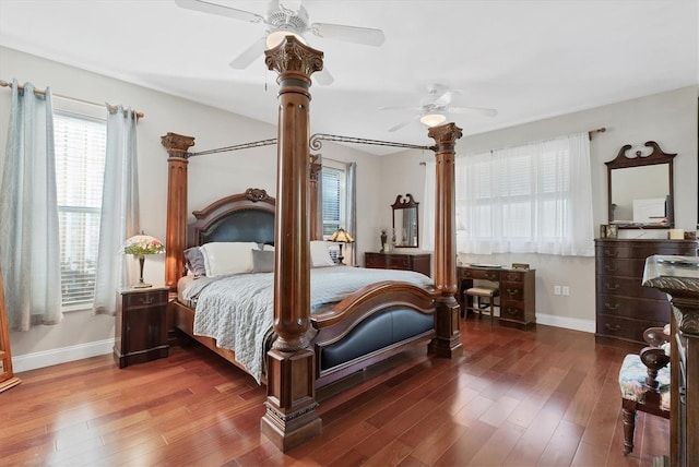 bedroom with hardwood / wood-style flooring and ceiling fan