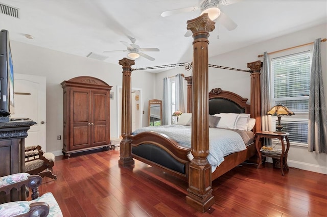 bedroom with ceiling fan and dark hardwood / wood-style flooring