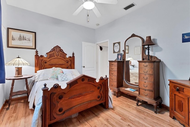 bedroom featuring ceiling fan and light hardwood / wood-style floors