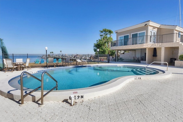 view of pool featuring a patio area