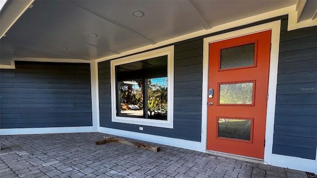 property entrance with a porch