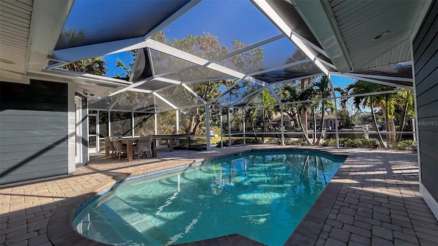 view of pool featuring a lanai and a patio area