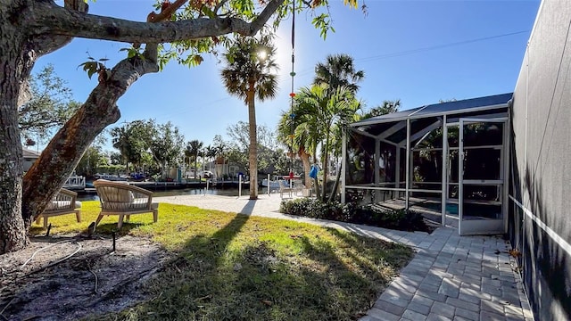 view of yard with a lanai