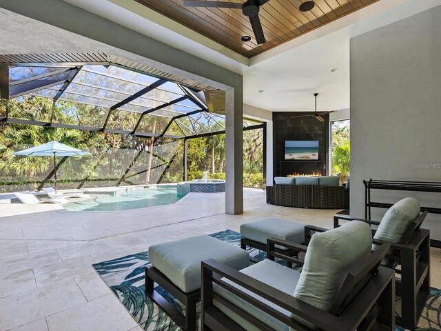 view of patio featuring a lanai and an outdoor hangout area