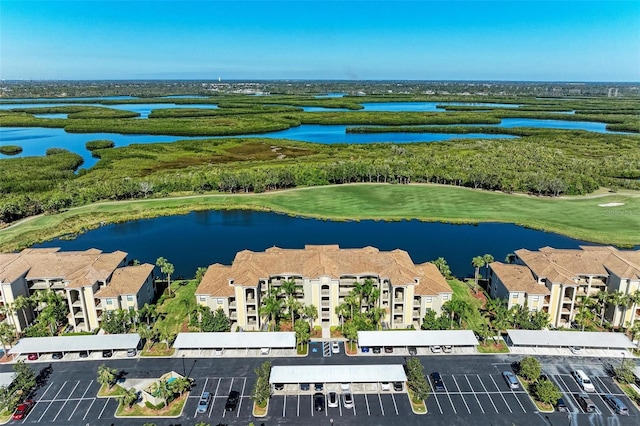 bird's eye view with a water view