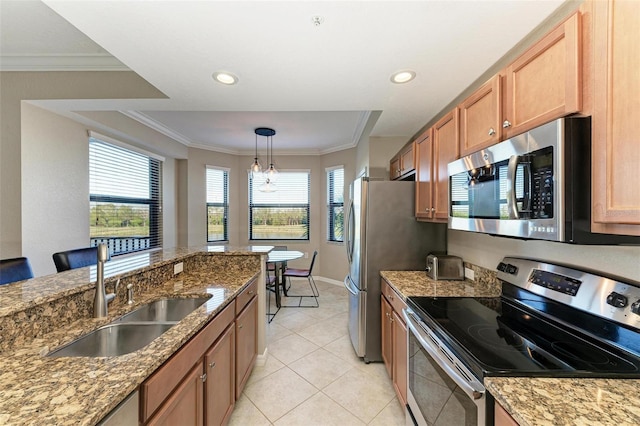 kitchen featuring pendant lighting, sink, light stone countertops, light tile patterned floors, and stainless steel appliances