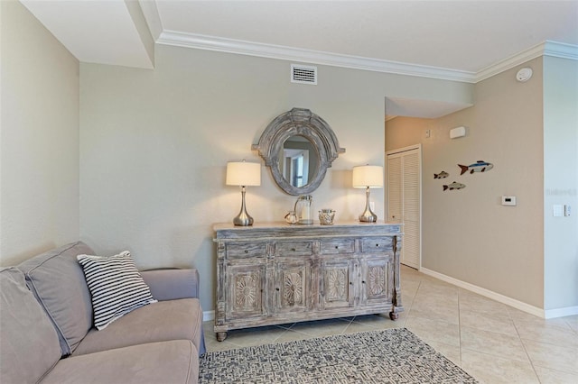 interior space with light tile patterned flooring and ornamental molding