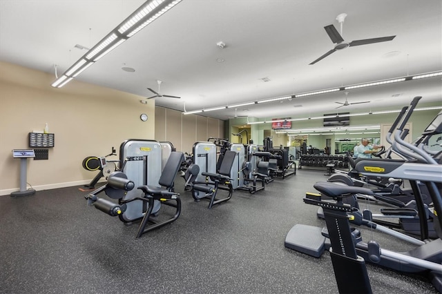 exercise room with ceiling fan