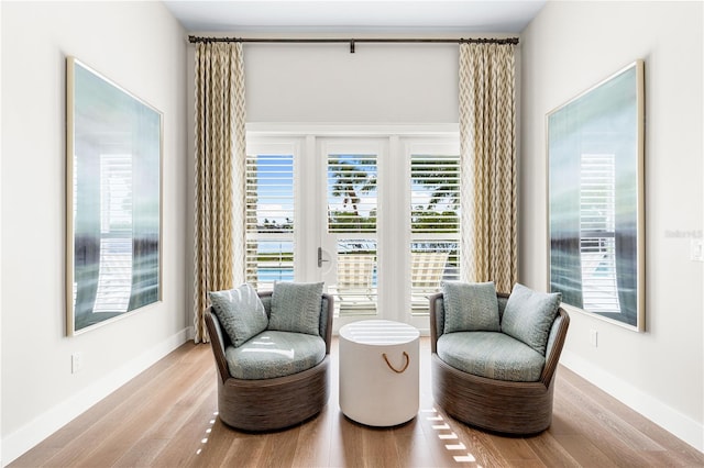 living area featuring light hardwood / wood-style floors