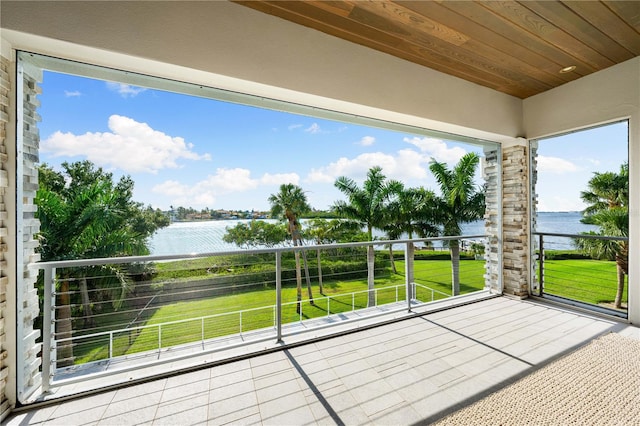 balcony featuring a water view