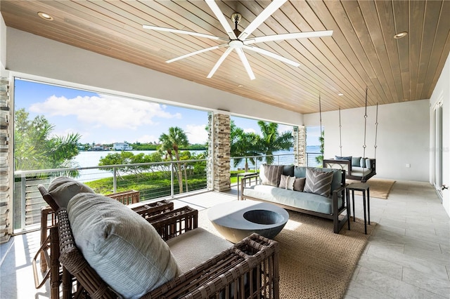 931 Bayshore Rd, Nokomis, FL 34275 - view of patio with ceiling fan, a water view, and an outdoor hangout area