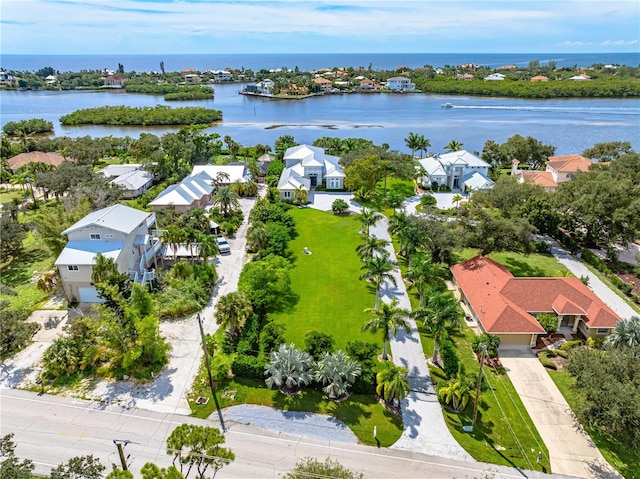 bird's eye view with a water view