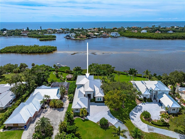 drone / aerial view with a water view