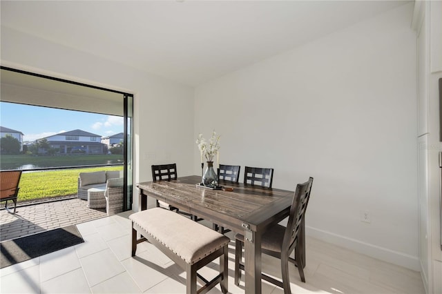 view of tiled dining space